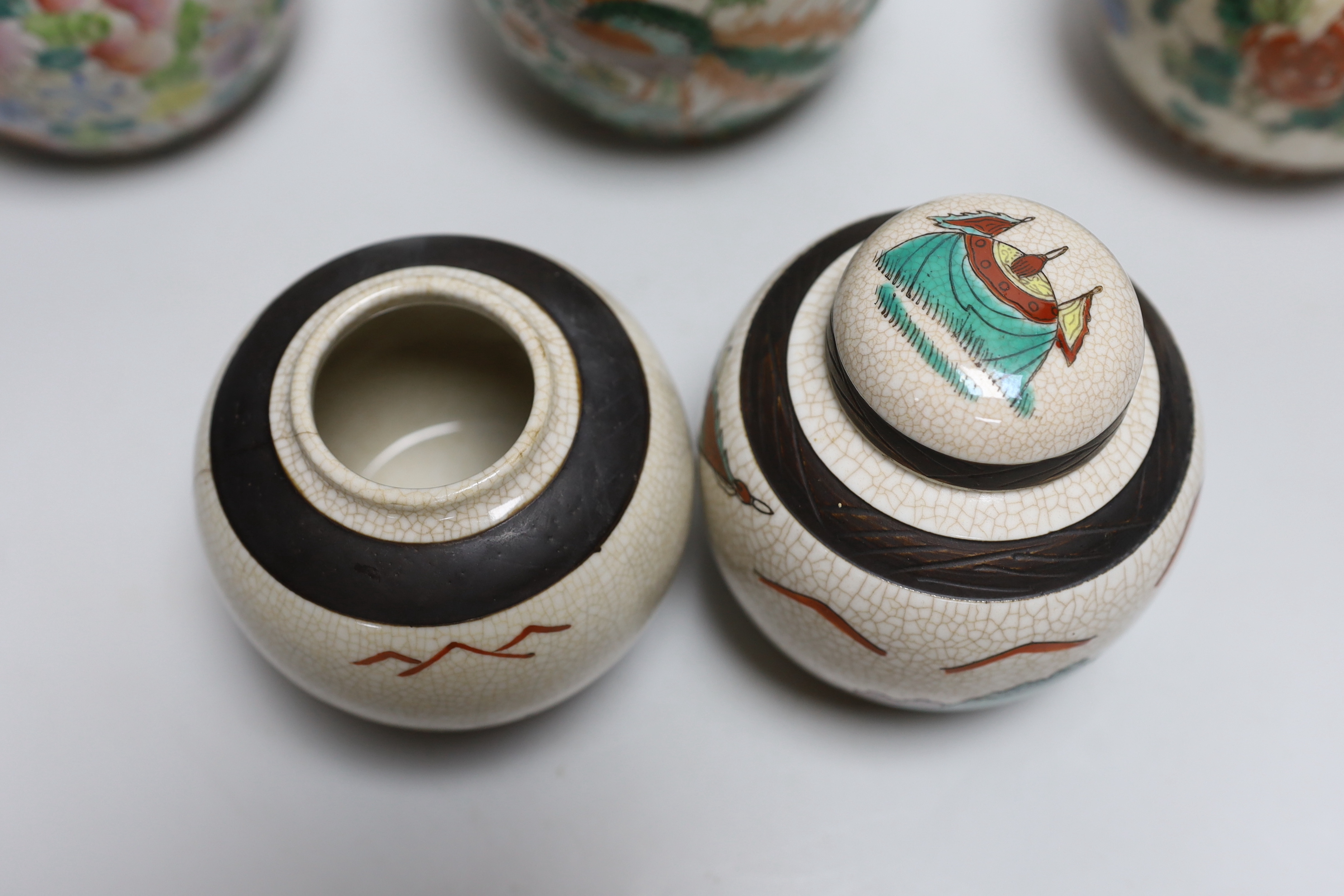 Five Chinese enamelled porcelain ginger jars, one with a cover, tallest 12cm high